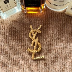 Beautiful  signed gold tone YSL brooch